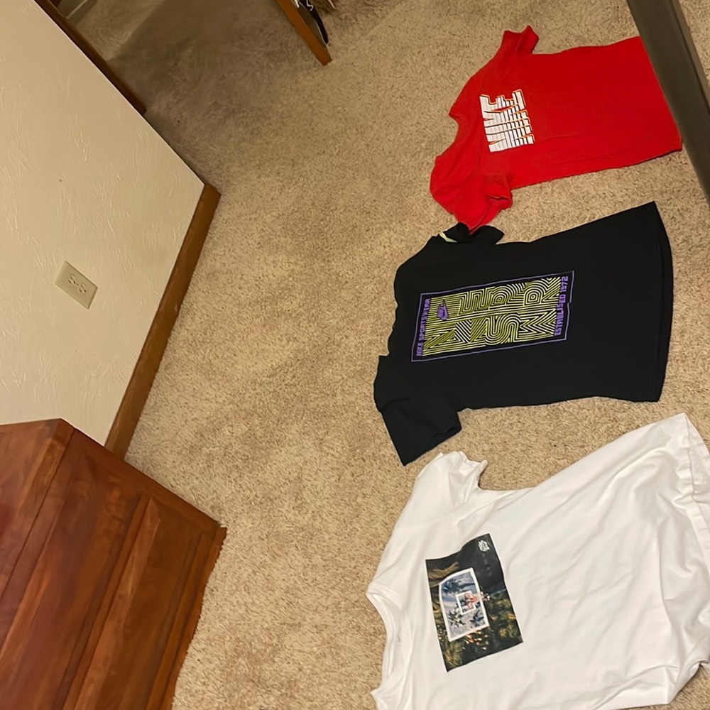 3 Nike graphic tees.